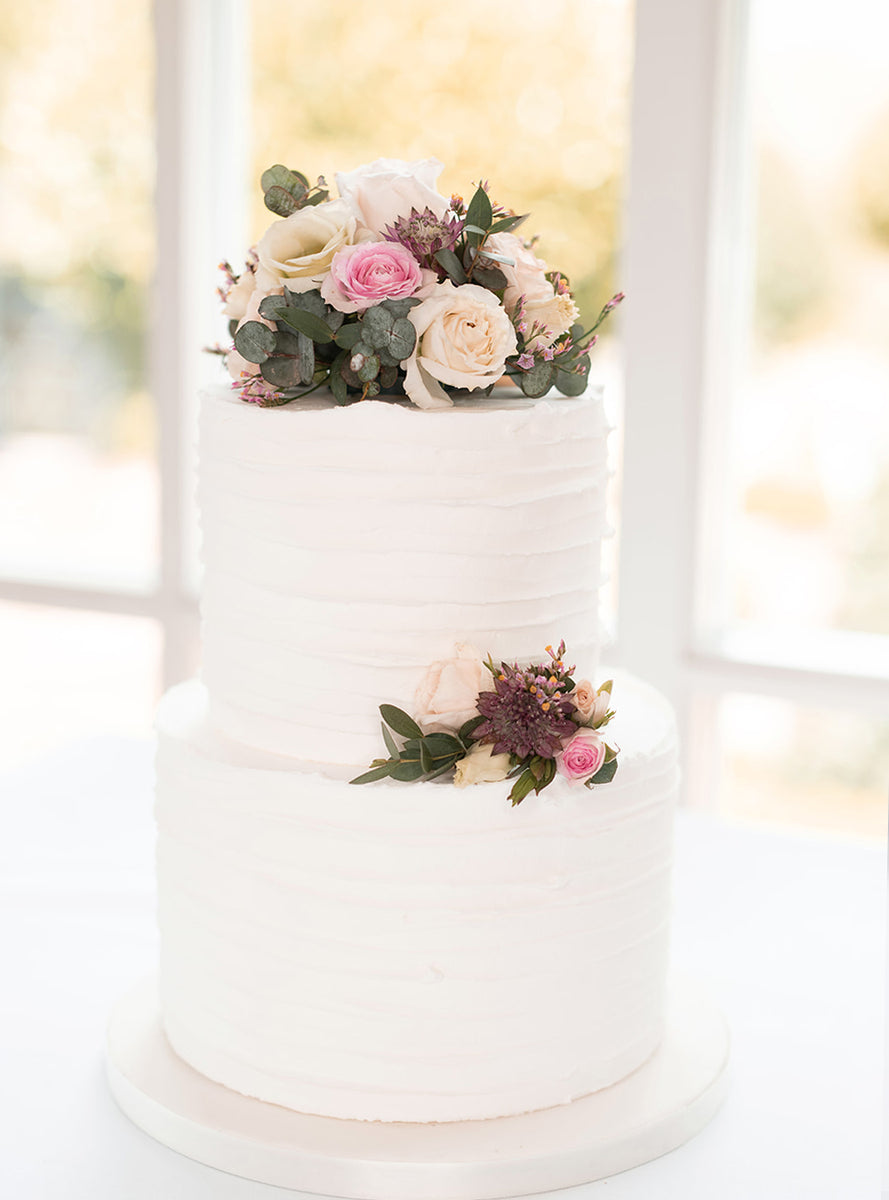 Rustic Iced Wedding Cake in White - Order online from The Cakery ...